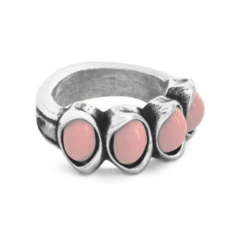 Silver ring with four pink crystals